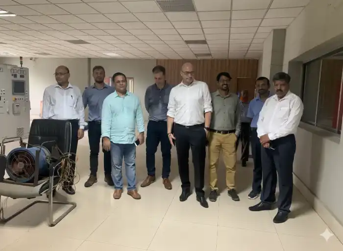 Group of colleagues standing together at an industrial site