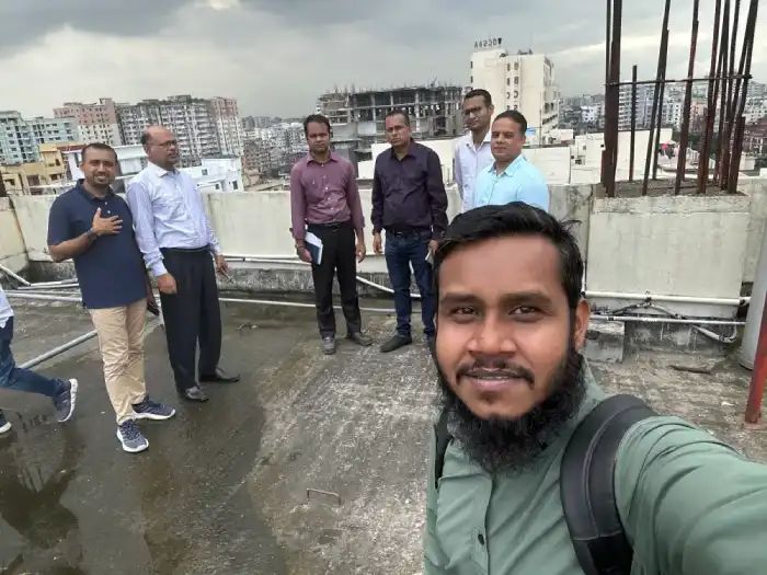 Inspection team gathering on a rooftop