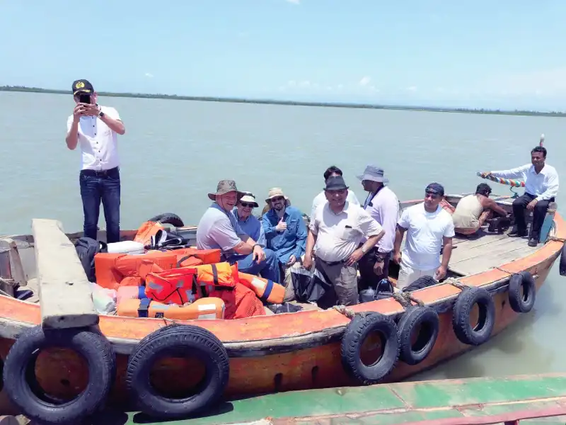 Site visitors gathered on a larger boat