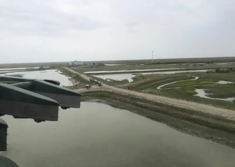 Aerial view of waterways and access road at a project area