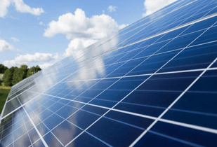 Solar panels under a blue sky